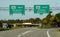 Ontario, Canada - October 28, 2019 - The view of the highway on Route 401 splits with striking fall foliage