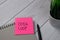 OODA LOOP write on sticky note isolated on wooden table