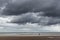 Oostduinkerke, Belgium - Octobr 23, 2020: Nice view of the North Sea beach under heavy clouds