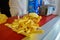 Oosterscheldekering, the Netherlands, August 2019. The main course at a street food kiosk: French fries. A portion is ready to be