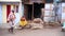 OOTY, INDIA - MARCH 2013: Local woman hanging laundry