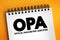 OPA - Optical Parametric Amplifier acronym text on notepad, abbreviation concept background