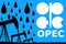 OPEC logo, oil drops and silhouette industrial oil pump jack on blue background