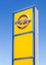 Opel dealership sign against blue sky