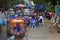 Open air hawker foodstall by the road side with tables and chairs