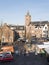 Open air market in the foreground of large old curch in dutch town of naarden vesting