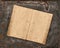 Open antique recipe book on rustic textured background