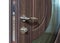 Open armored door. Door lock, Dark brown door closeup. Modern interior design, door handle. New house concept. Real estate.