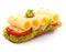 Open baguette sandwich with rolled cheese