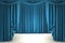 Open blue theater curtain