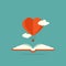 Open book with heart air balloon and clouds isolated on blue background