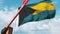 Open boom gate on the Bahamian flag background. Free entry or lifting a ban in Bahamas