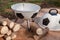 Open brazier in form of soccer ball stands in yard