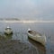 Open canoes in early light