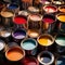 Open cans of paint in many colors, representing diversity and choice