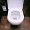 Open ceramic toilet bowl