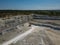 Open chalky quarry, aerial view from drone