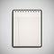 Open checked notebook isolated on grey