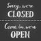 Open and closed chalk sign.