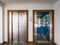 Open and closed chrome metal hotel building elevator doors realistic photo.