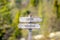 open closed text carved on wooden signpost outdoors in nature