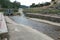 Open dam in the natural pool in the Arrago river to bathe in the summer with cold and crystalline water