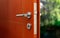 Open door of a family home. Close-up of the lock an armored door.