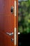 Open door of a family home. Close-up of the lock an armored door.