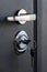 Open door of a family home. Close-up of the lock with your keys on an armored door. Key cylinder, close up photo. door