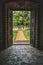 Open doors to the tropical garden at villa