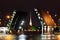 Open drawbridge at night in St. Petersburg