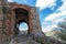 Open entrance door to a castle with the bars raised