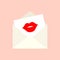 Open envelope with the imprint of a red kiss