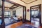 Open floor plan of living room and dining room in old style house.