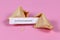 Open fortune cookie with motivational text `You are vibrating of energy and power`