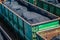 Open gondola car loaded with black coal