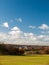 Open grass land farm agriculture plain blue sky above Wivenhoe