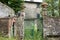 Open green gate at an abandoned Italian Villa