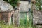 Open green gate at an abandoned Italian Villa