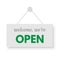 Open green signboard hanged on wall. Rectangular shape clipboard for retail, shop, store, cafe, bar, restaurant