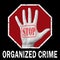 Open hand with the text stop crime organized. Global social problem