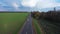 Open highway and rainbow aerial view