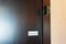 Open hotel deadlock on wooden door from inside of the room