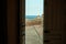 Open house door with sea views