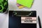 Open House text on sticky notes with office desk concept