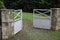 Open iron gate at the entrance to the house on the ranch