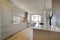 Open kitchen island with white acrylic doors