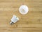 Open LED light bulb on a wooden background
