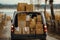 Open lorry car trunk full of moving cardboard boxes and furniture outdoors at city street.