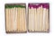 Open matchboxes of wooden matches with purple and green heads